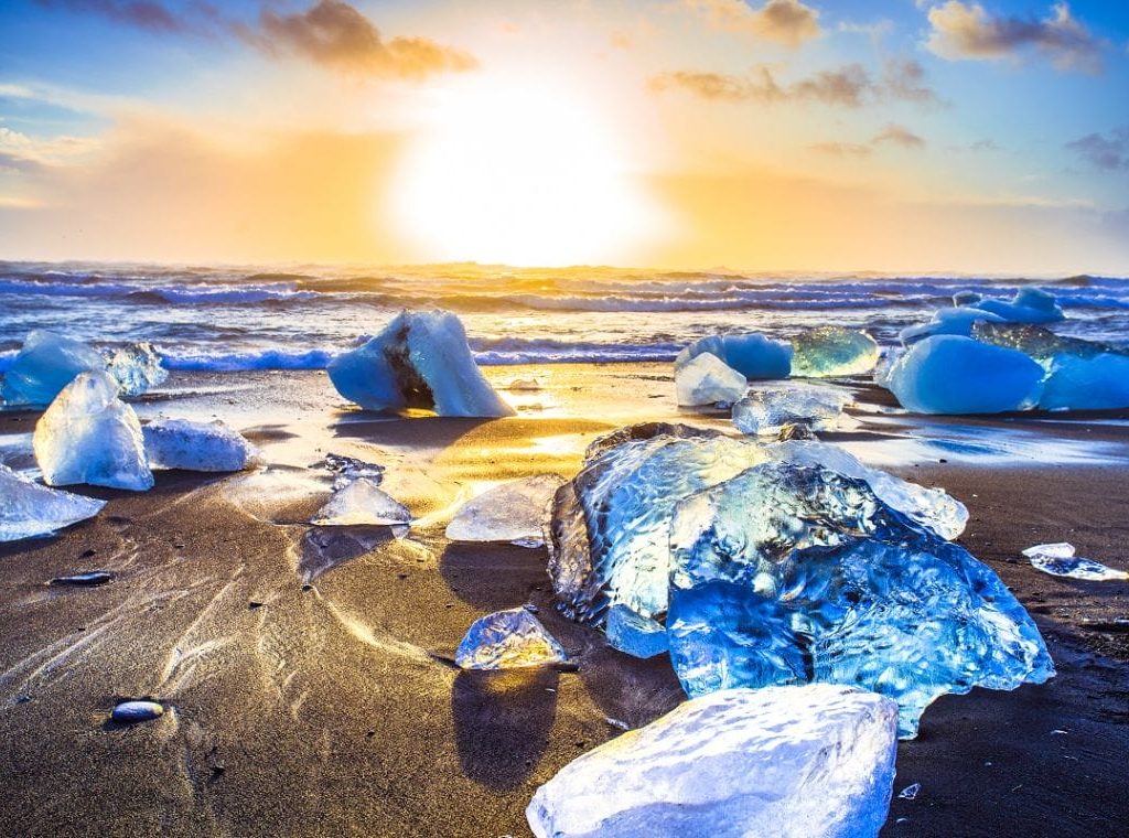 Ice,Rock,With,Black,Sand,Beach,At,Jokulsarlon,Beach,(diamond